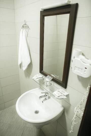 Фото номера Двухместный номер с 2 отдельными кроватями Отель Georg Palace Hotel г. Черновцы 11