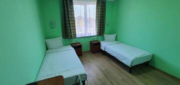 Фото номера Двухместный номер с 2 отдельными кроватями Отель Luxor Inn &amp; Suites г. Черновцы 4