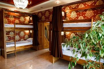Фото номера Односпальная кровать в общем номере с 10 кроватями Хостелы Sweet Home Hostel / Guest House г. Черновцы 4